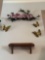 butterfly wall decor, fake plant decor, and wooden decor