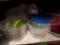 crockpot, plastic containers, and strainer