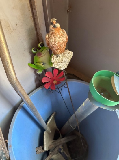 Rain gauge yard ornaments, teapot, bucket, and rebar