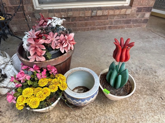 Flower pots with wood and artificial flowers