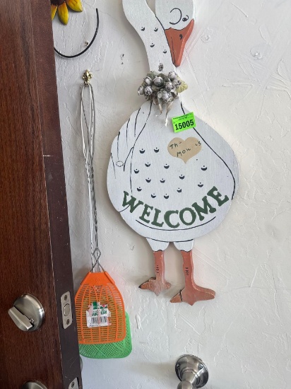 goose wall decor, and flyswatters
