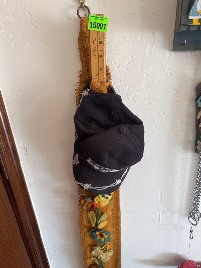 measuring stick and hat