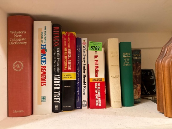 books, book holder and clock