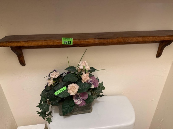 wall decor and toilet paper holder