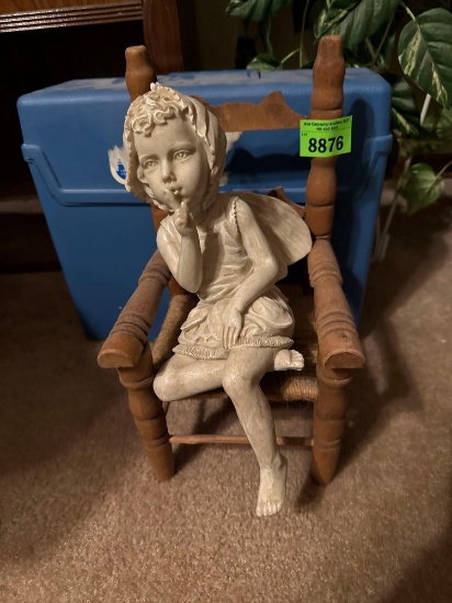 Girl on a seat, and box