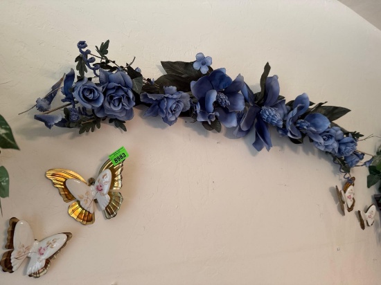 Wild decor, butter, butterflies, and artificial flowers
