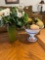 Fruit bowl with fake fruit and artifical flowers in vase