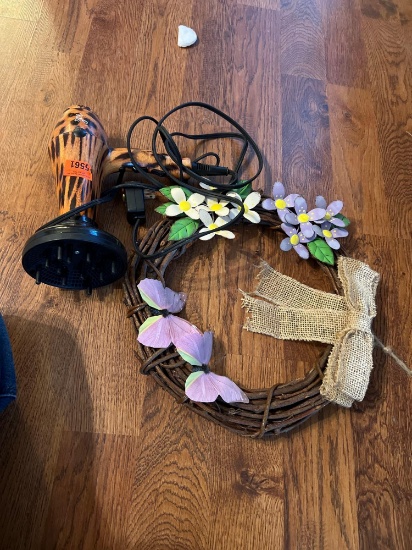 Blow dryer with defuser and a wreath