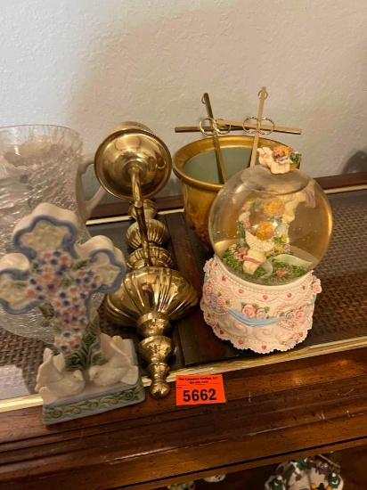 Snow globe, cross, sconce and other decor