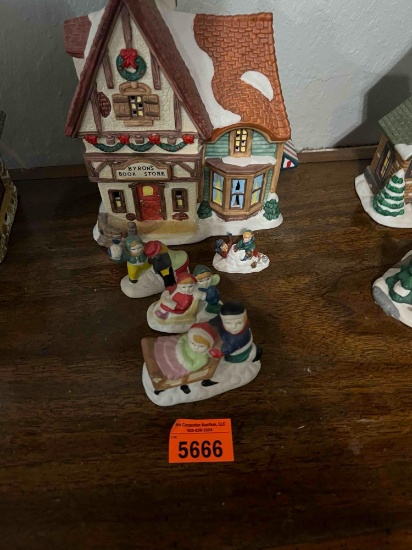 Christmas village book store with Christmas figurines