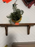 Wall shelf and artifical plant
