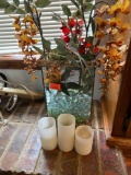 Glass vase with artifical flower arrangement and 3 battery candles