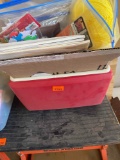 Ice chest, Picture hangers, Dog harness, pine cones, tape and other items