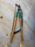 Bow saw and tree loppers