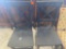 2 black wooden chairs