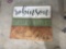 3 wooden wall hangings