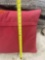 2 pillows and a rug