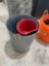 Rope, metal trash can, red bucket