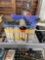Metal tin with nails, and dust pans