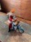 Santa and elf on motorcycle