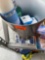 Trash can with soap, listerine and bathroom cleaner