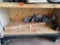 Items on shelf, poster, bolts, filter and more