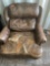 Leather chair Damage shown in photo *BUYER IS RESPONSIBLE FOR LOADING*