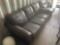 Leather sofa damage noted in photo *BUYER IS RESPONSIBLE FOR LOADING*