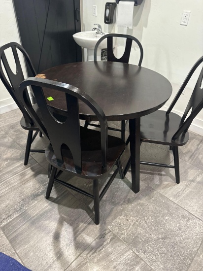 Table and 4 chairs Must bring help to load