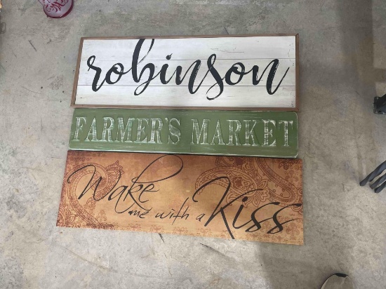 3 wooden wall hangings