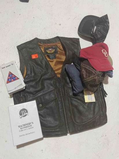 Leather vest, Machinery's handbook, baseball hats
