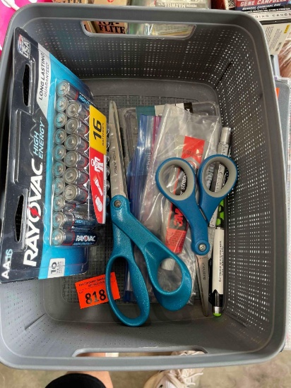 Batteries, scissors in tub