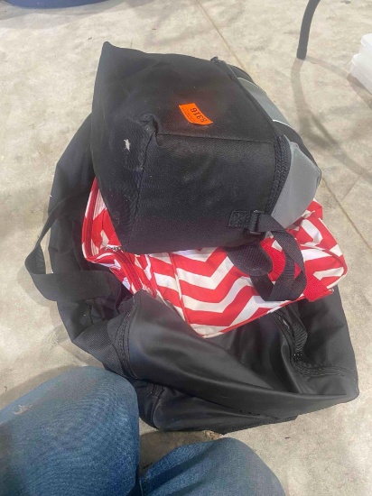 Lunch pail, Nike bag and red and white bag