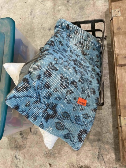 Metal basket with pillows