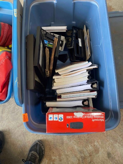 Tote with office supplies, wireless keyboard and books