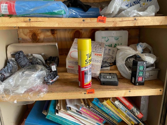 Items on shelf. tuff stuff, first aide kit, and more