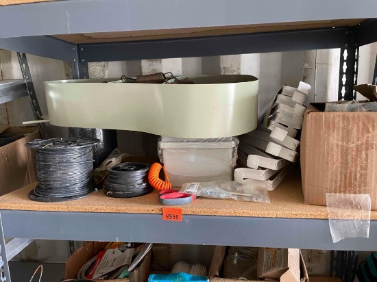 Spool of wire, scissors, metal hangers and more
