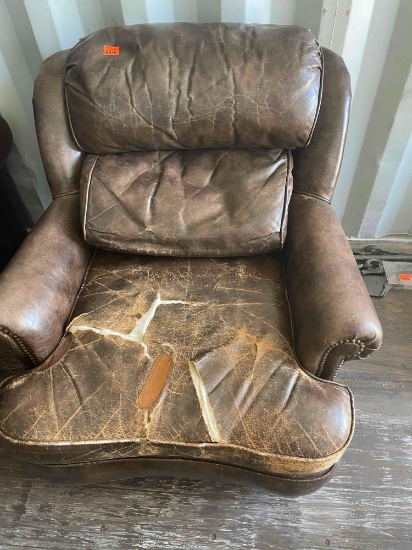 Leather chair Damage shown in photo *BUYER IS RESPONSIBLE FOR LOADING*