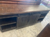Rustic TV stand with sliding doors and casters Must bring help to load