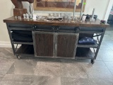 Rustic buffet with sliding doors and casters 36x72x20 content not included Must bring help to load