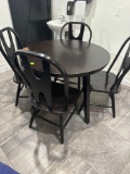 Table and 4 chairs Must bring help to load