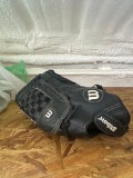 Wilson mit and 2 balls