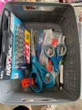 Batteries, scissors in tub