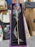 Glass and gold rose with stand