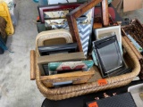 Wicker basket with picture frames