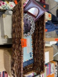 Wicker basket with a few picture frames