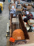 Wicker basket with coasters and fly swatters