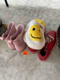 Red leather shoes. slippers and rain boots