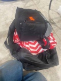 Lunch pail, Nike bag and red and white bag