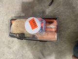 Ear plugss and gun cleaning kit